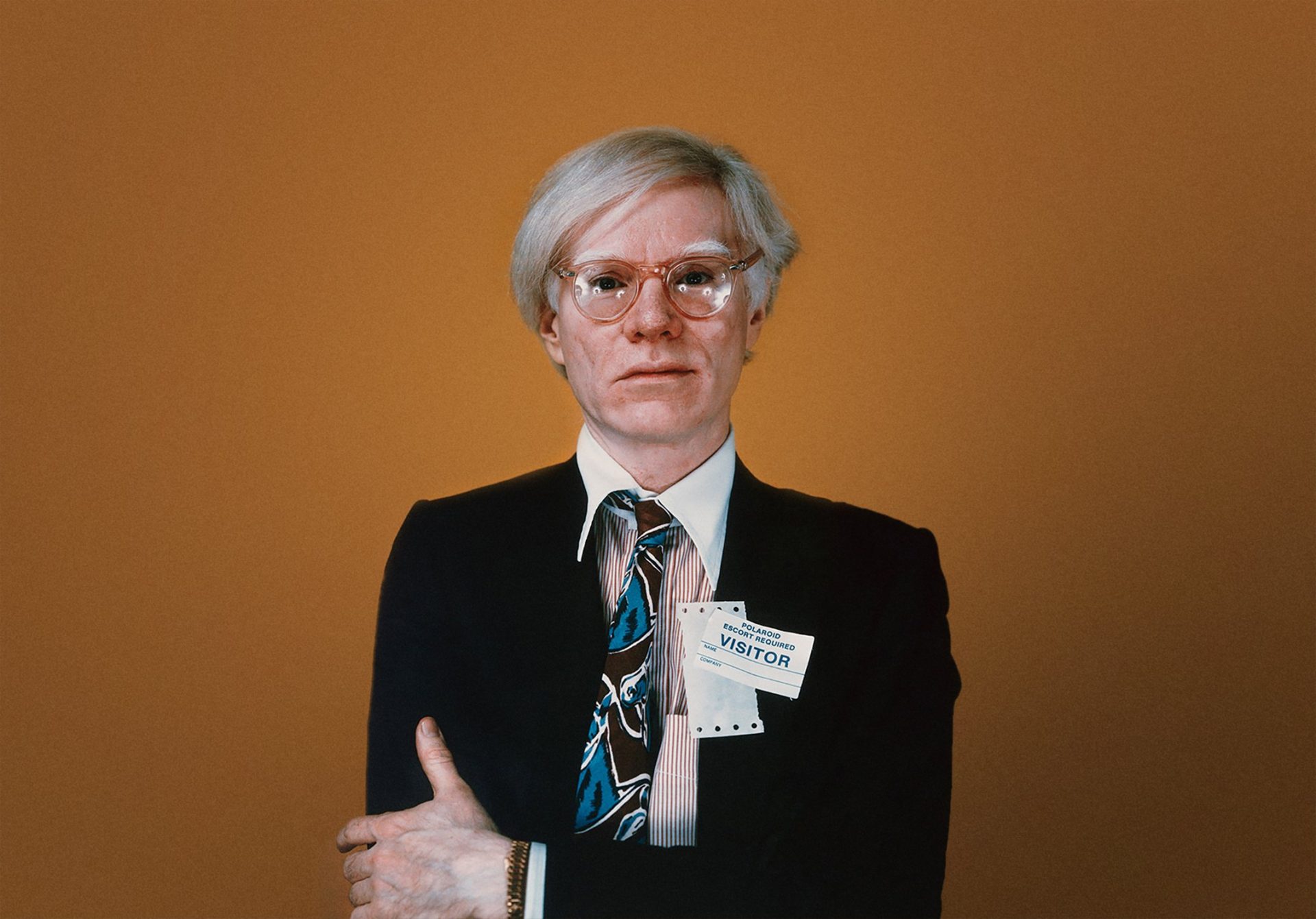 Warhol wearing a gold Rolex in Understanding Andy Warhol as a collector for A Collected Man